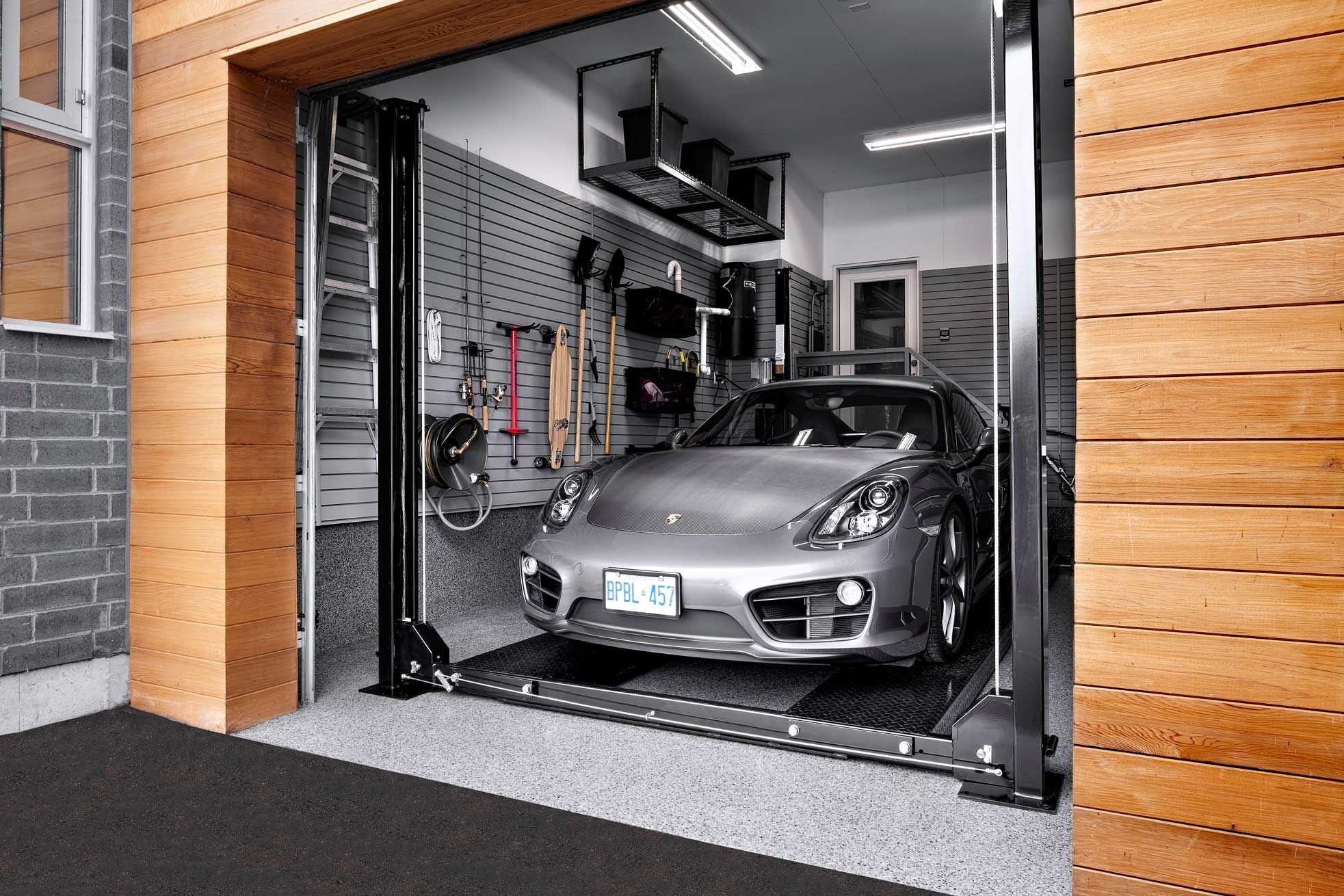 Сток гараж. Дизайнерская отделка гаража. Красивый гараж. Современный гараж интерьер. Красивый гараж внутри.